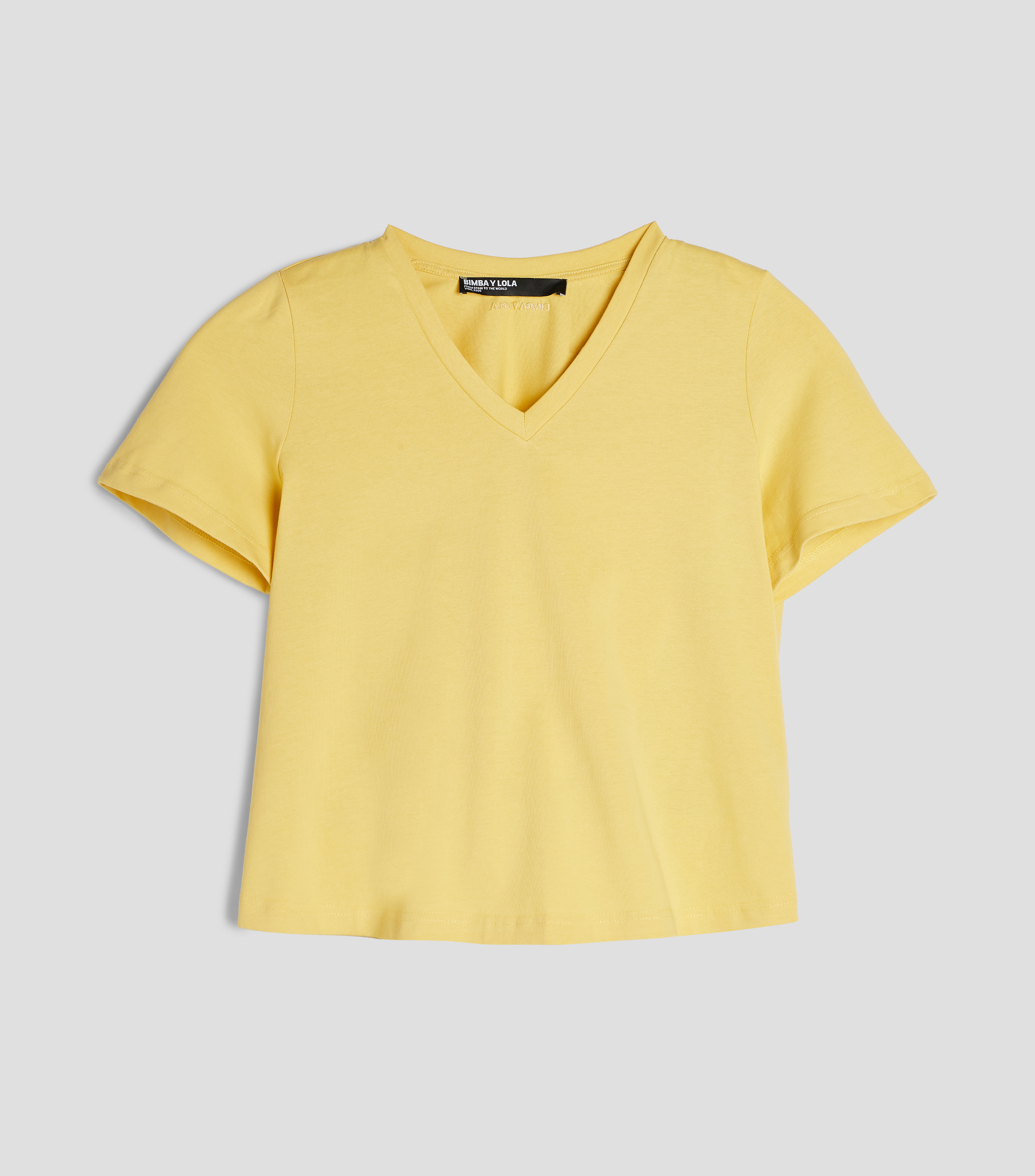 Playera cuello V manga corta lisa Mujer